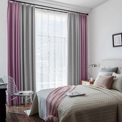 Combination of wallpaper and curtains in the bedroom interior