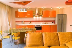 Gray wallpaper and orange kitchen photo