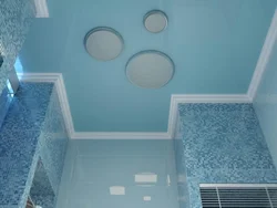 Plinth on the ceiling in the bathtub photo