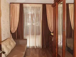 Design of curtains for the living room on the ceiling cornice