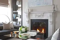 Interior with white fireplace in apartment