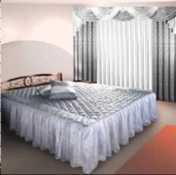 Curtains for the bedroom with a bedspread photo