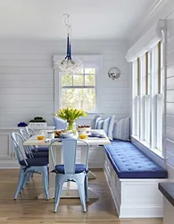 Blue sofa in the kitchen in the interior