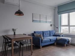 Blue sofa in the kitchen in the interior