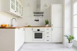 White Corner Kitchen Design