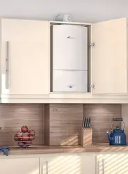 Photo of a kitchen with a gas boiler on the wall and pipes