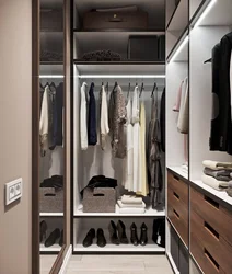 Wardrobe layout photo in the apartment