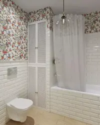 Bathroom made of plastic panels design in a wooden house