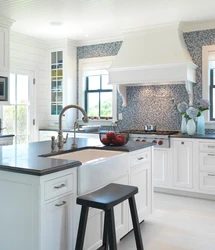 White Kitchen With Blue Apron Photo