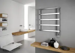 Water Heated Towel Rail For The Bathroom Photo In The Interior
