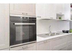 White Cooktop And Oven In The Kitchen Photo