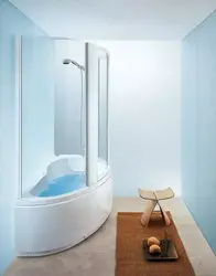 Corner bath with shower in the interior