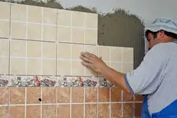 Laying tiles in the kitchen photo