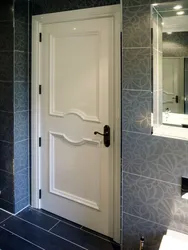 Interior doors to the bathroom and toilet photo