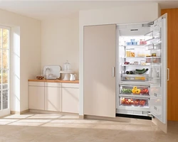 Freezer and refrigerator in the kitchen photo