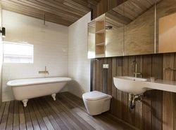 Finishing the bathroom with wooden panels photo