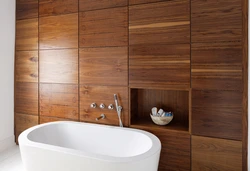 Finishing the bathroom with wooden panels photo