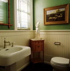 Finishing the bathroom with wooden panels photo