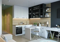 Kitchen with a bar counter in a studio 25 sq m photo