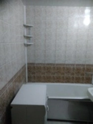 Bathroom In Khrushchev With PVC Panels Photo