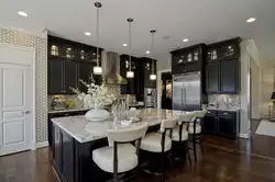 Black lamps in the kitchen interior