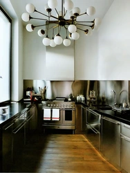 Black lamps in the kitchen interior