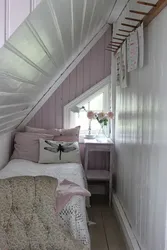 Дызайн спальні на дачы ў драўляным