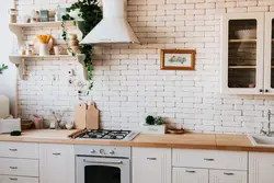 Wallpaper bricks in the kitchen in the interior