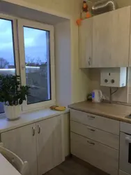 Kitchens in Khrushchev with a gas water heater and a refrigerator photo 5