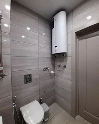 Photo Of A Bathtub With A Boiler