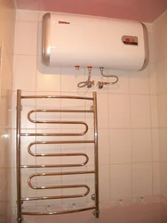 Photo of a bathtub with a boiler