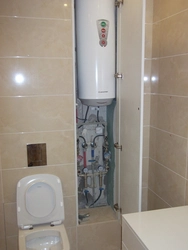 Photo of a bathtub with a boiler