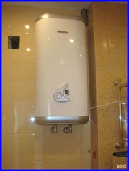 Photo of a bathtub with a boiler