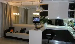 Kitchen living room design with bar counter and sofa