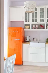 Kitchen design with orange refrigerator