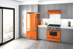 Kitchen design with orange refrigerator