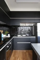 Kitchen interior with dark tiles photo