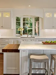 Kitchen Design In A Modern Style With A Window In The Middle Photo