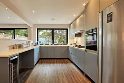Kitchen Design In A Modern Style With A Window In The Middle Photo