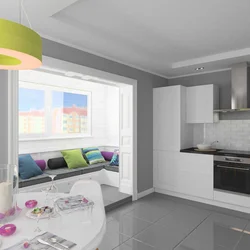Photo of a living room kitchen in an apartment with a balcony