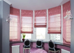 Roman blinds for plastic windows in the kitchen photo
