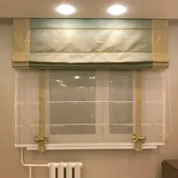 Roman blinds for plastic windows in the kitchen photo