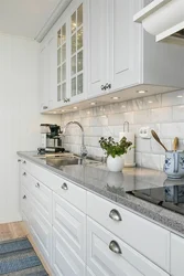 White kitchen interior with white countertop