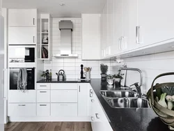 White kitchen interior with white countertop