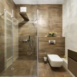 Shower cabin made of tiles in the bathroom photo