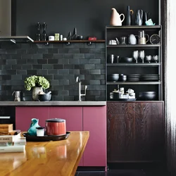 Black wallpaper in the kitchen in the interior