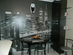 Black wallpaper in the kitchen in the interior