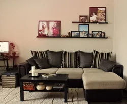 Shelves above the sofa in the living room photo