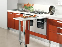 Kitchens with a pull-out table from under the countertop photo