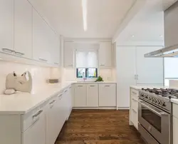 White Kitchen Up To The Ceiling In The Interior Photo